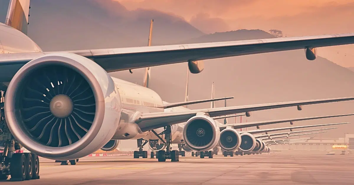 Multiple airplanes on an airport.